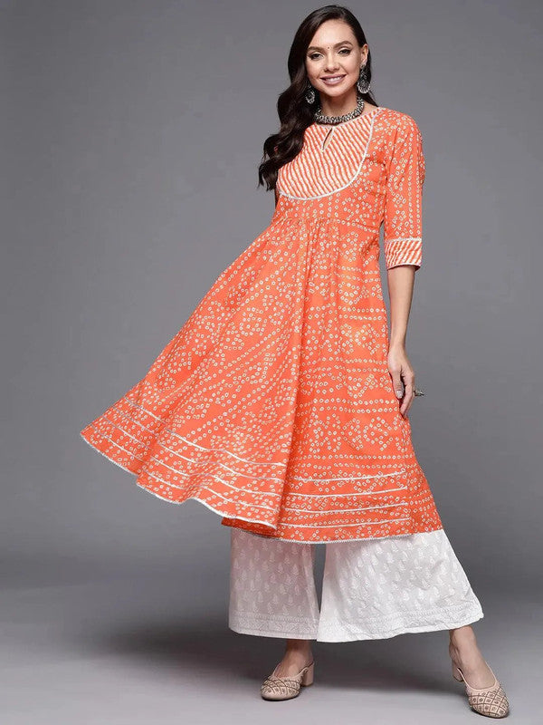 LIBAS Orange Printed Cotton Anarkali Kurta, breezy cotton wear with a beautifully structured anarkali silhouette.