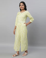 AURELIA Printed Jumpsuit with Lace Trims in Green, contemporary ethnic fusion with stylish trims.