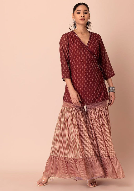 INDYA Maroon Tiered Sharara And Angrakha Kurta, structured ethnic wear with tiered detailing.
