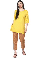GERUA BY LIBAS Womens Round Neck Solid Tunic in Yellow, minimalistic tunic featuring a structured round neck design.